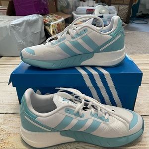 White and blue Adidas ZX 1K athletic shoes